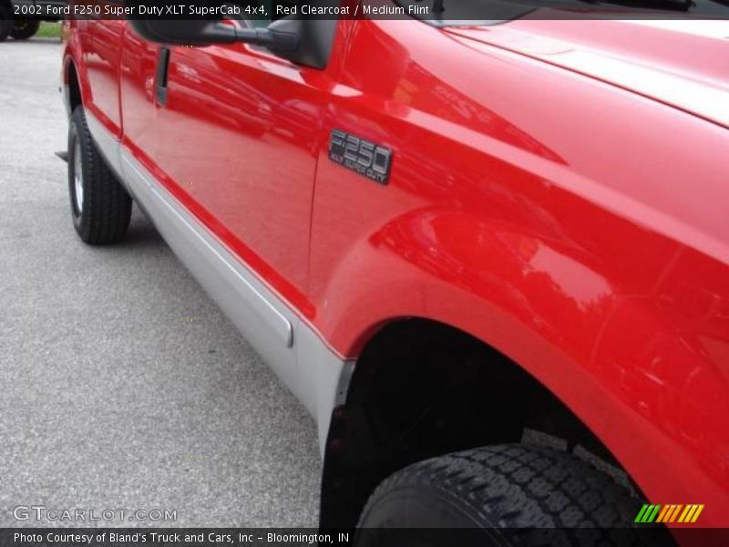 Red Clearcoat / Medium Flint 2002 Ford F250 Super Duty XLT SuperCab 4x4