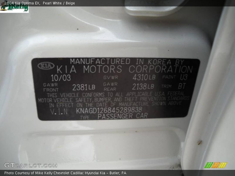 Pearl White / Beige 2004 Kia Optima EX