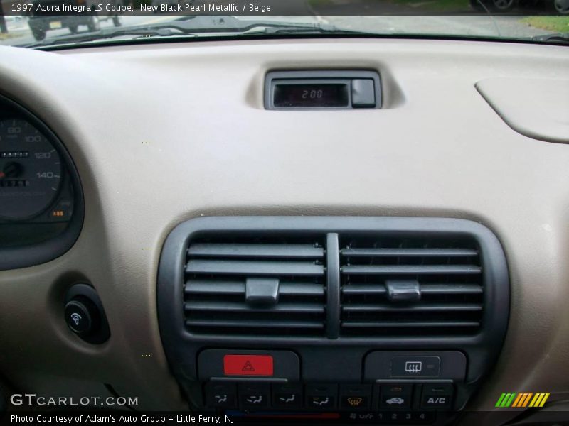 New Black Pearl Metallic / Beige 1997 Acura Integra LS Coupe