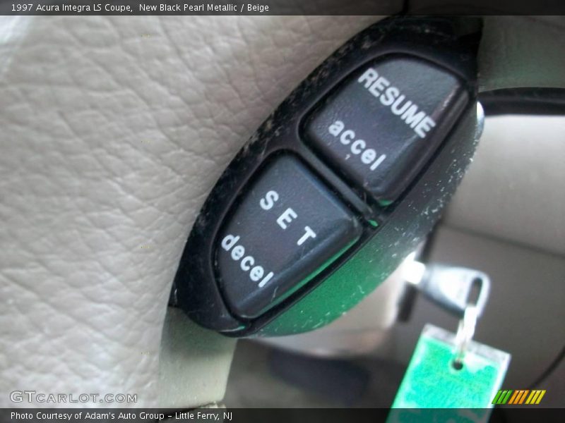 New Black Pearl Metallic / Beige 1997 Acura Integra LS Coupe