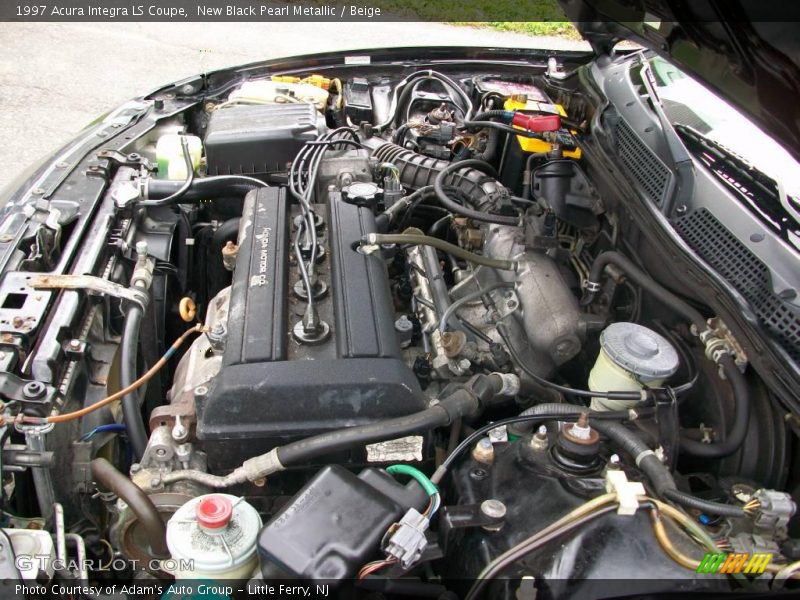New Black Pearl Metallic / Beige 1997 Acura Integra LS Coupe