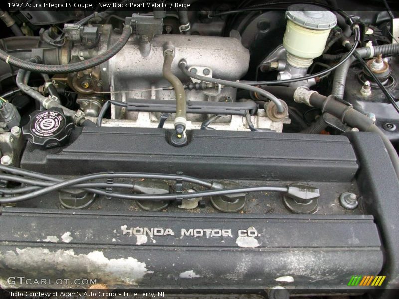 New Black Pearl Metallic / Beige 1997 Acura Integra LS Coupe
