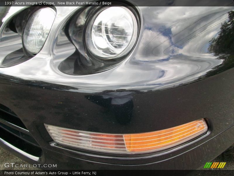 New Black Pearl Metallic / Beige 1997 Acura Integra LS Coupe