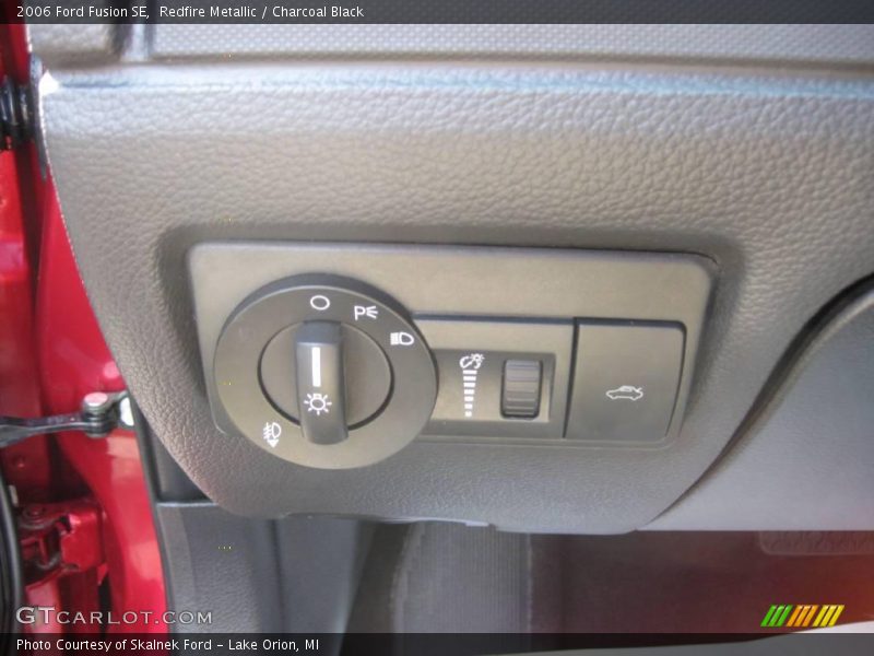 Redfire Metallic / Charcoal Black 2006 Ford Fusion SE