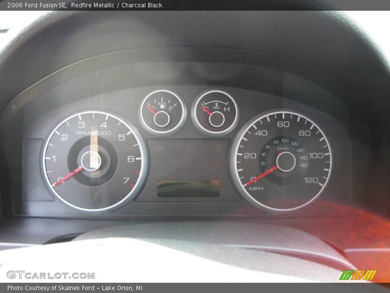 Redfire Metallic / Charcoal Black 2006 Ford Fusion SE