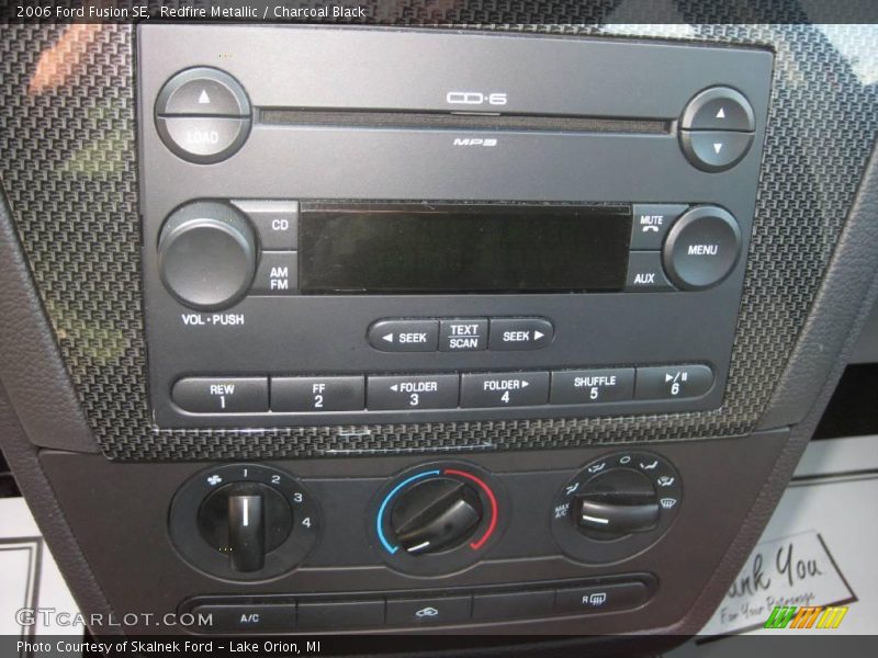 Redfire Metallic / Charcoal Black 2006 Ford Fusion SE