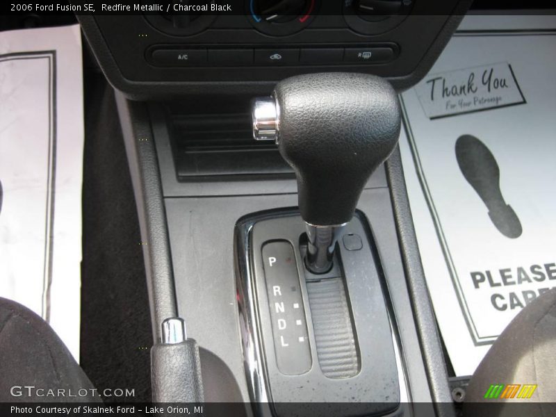 Redfire Metallic / Charcoal Black 2006 Ford Fusion SE