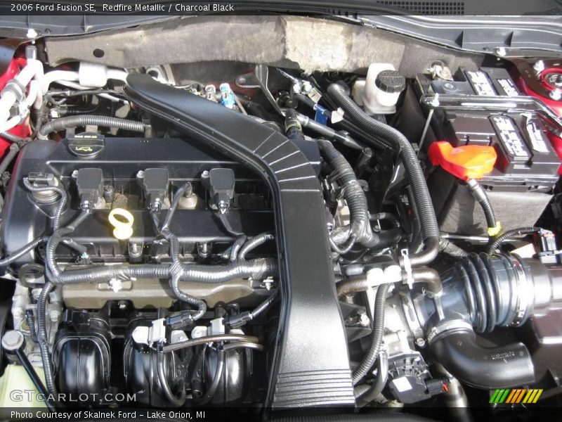 Redfire Metallic / Charcoal Black 2006 Ford Fusion SE