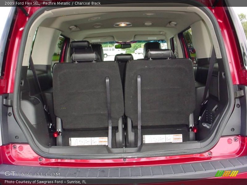 Redfire Metallic / Charcoal Black 2009 Ford Flex SEL