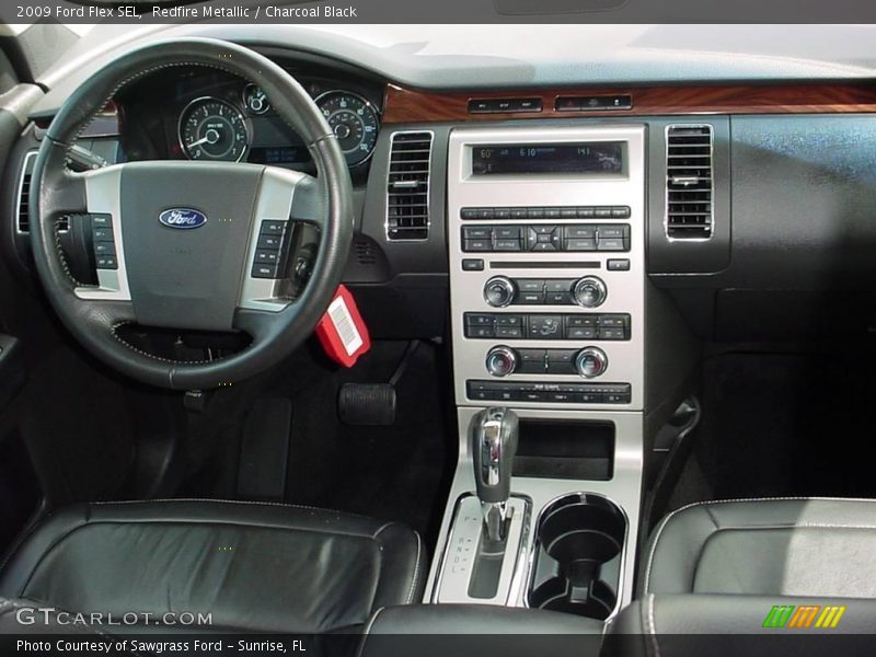 Redfire Metallic / Charcoal Black 2009 Ford Flex SEL