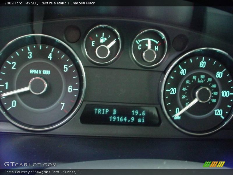 Redfire Metallic / Charcoal Black 2009 Ford Flex SEL