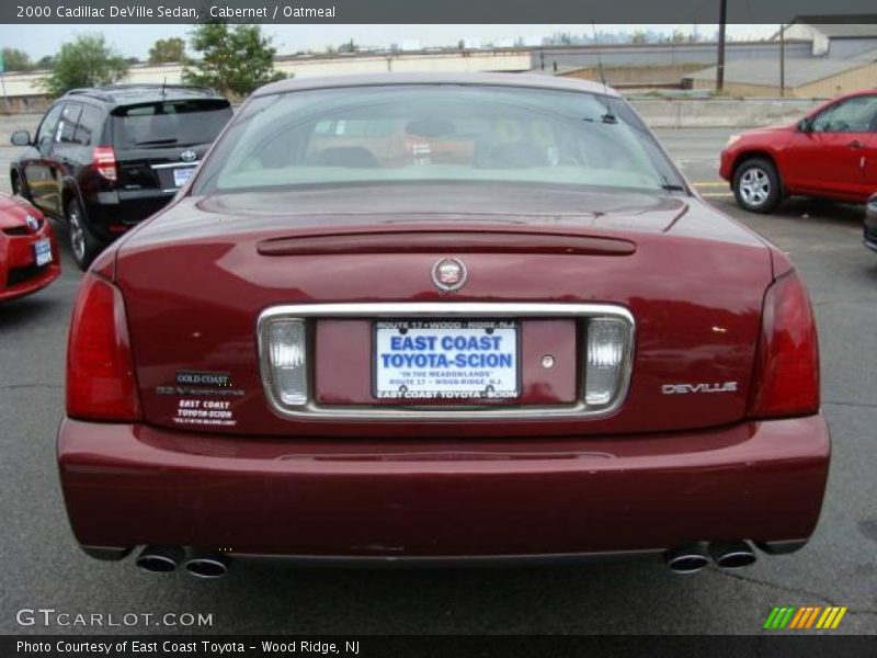 Cabernet / Oatmeal 2000 Cadillac DeVille Sedan