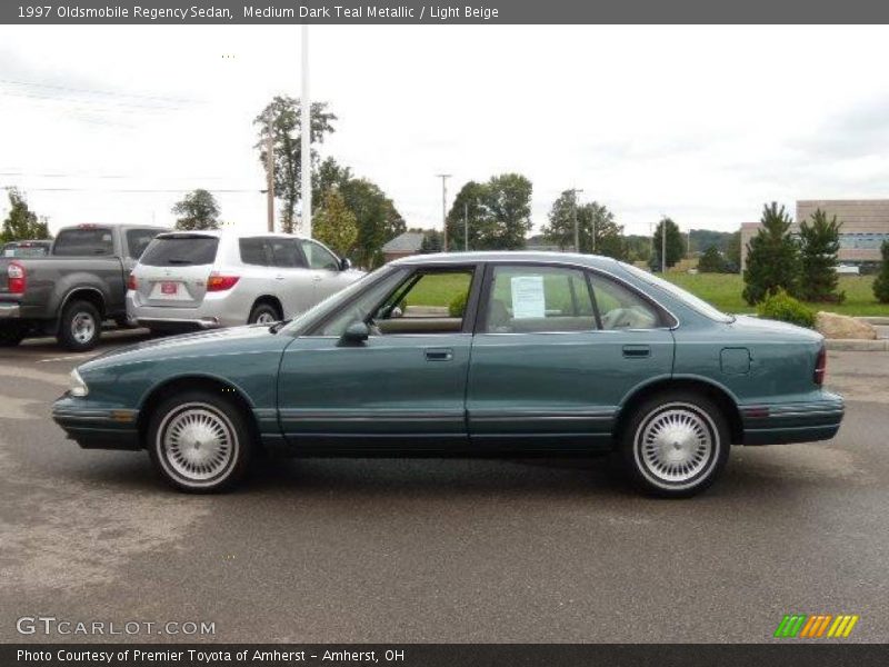 Medium Dark Teal Metallic / Light Beige 1997 Oldsmobile Regency Sedan