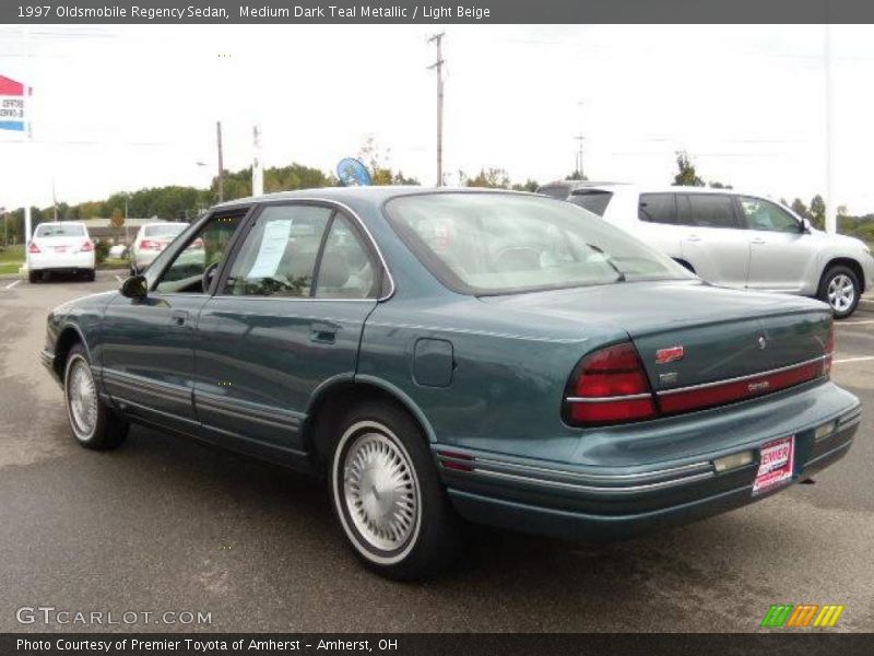 Medium Dark Teal Metallic / Light Beige 1997 Oldsmobile Regency Sedan