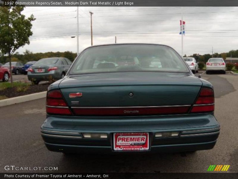 Medium Dark Teal Metallic / Light Beige 1997 Oldsmobile Regency Sedan