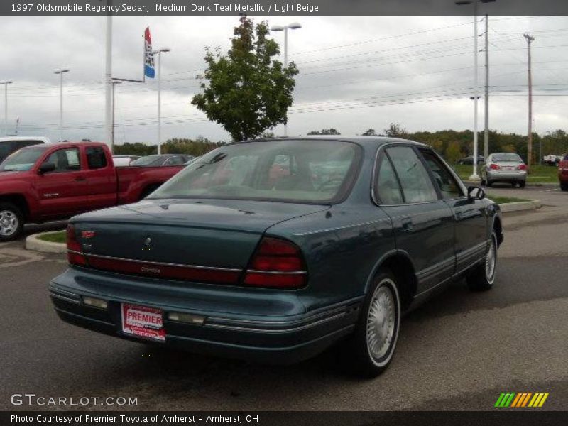 Medium Dark Teal Metallic / Light Beige 1997 Oldsmobile Regency Sedan