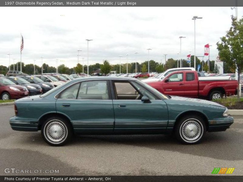 Medium Dark Teal Metallic / Light Beige 1997 Oldsmobile Regency Sedan