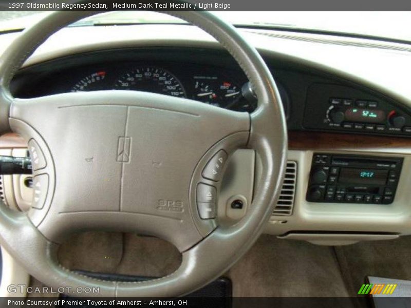 Medium Dark Teal Metallic / Light Beige 1997 Oldsmobile Regency Sedan