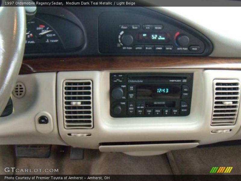 Medium Dark Teal Metallic / Light Beige 1997 Oldsmobile Regency Sedan