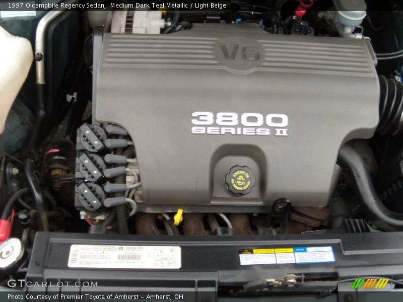 Medium Dark Teal Metallic / Light Beige 1997 Oldsmobile Regency Sedan