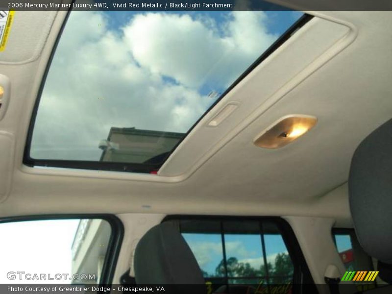 Vivid Red Metallic / Black/Light Parchment 2006 Mercury Mariner Luxury 4WD