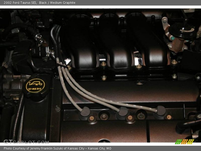 Black / Medium Graphite 2002 Ford Taurus SES