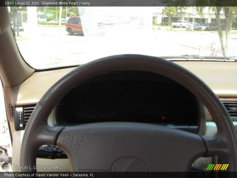 Diamond White Pearl / Ivory 1997 Lexus SC 300