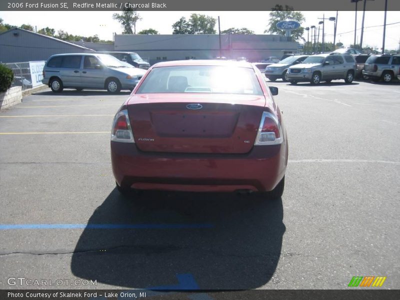 Redfire Metallic / Charcoal Black 2006 Ford Fusion SE