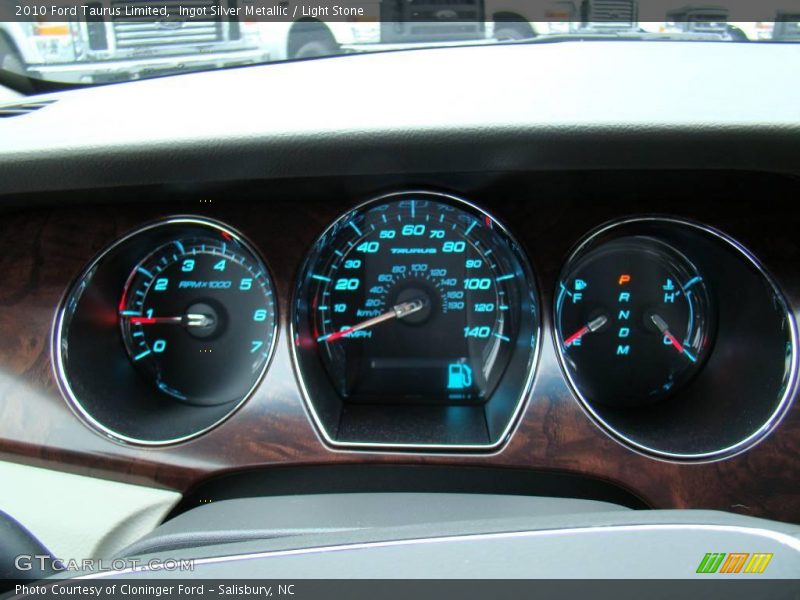 Ingot Silver Metallic / Light Stone 2010 Ford Taurus Limited
