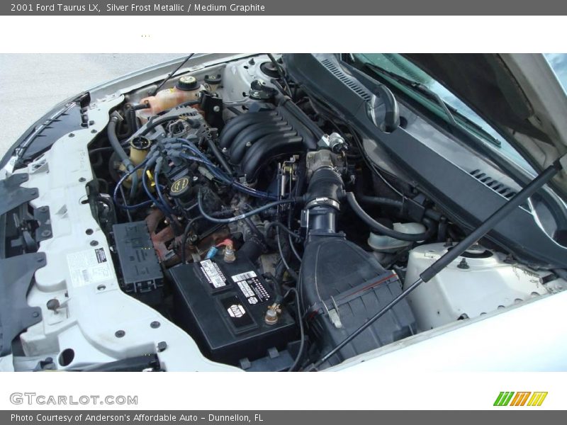 Silver Frost Metallic / Medium Graphite 2001 Ford Taurus LX