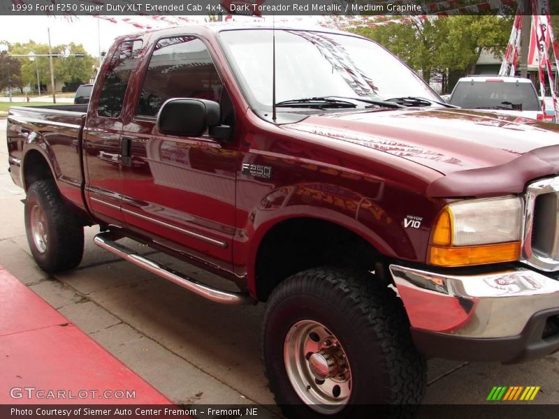 Dark Toreador Red Metallic / Medium Graphite 1999 Ford F250 Super Duty XLT Extended Cab 4x4