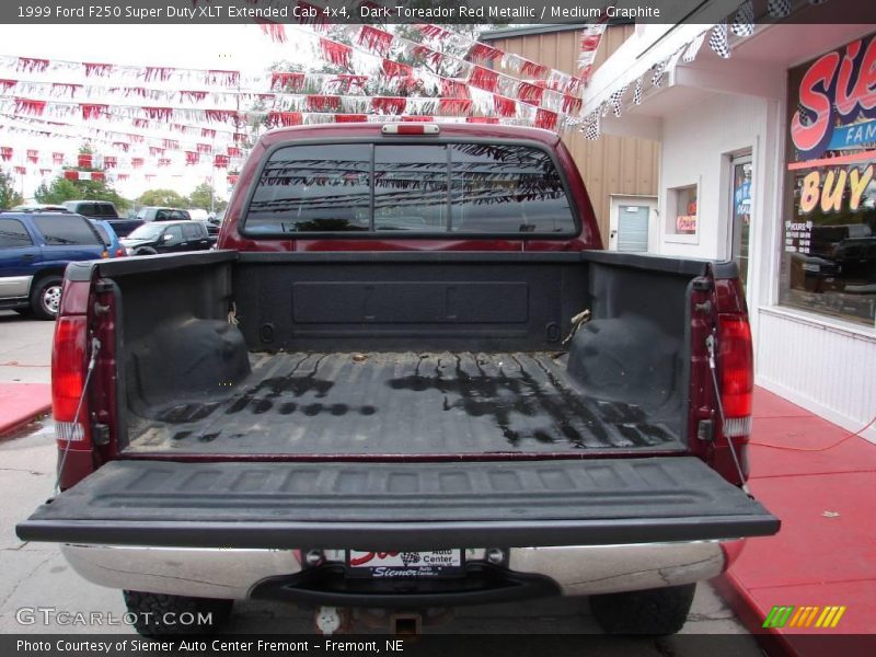 Dark Toreador Red Metallic / Medium Graphite 1999 Ford F250 Super Duty XLT Extended Cab 4x4
