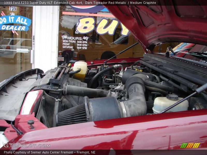 Dark Toreador Red Metallic / Medium Graphite 1999 Ford F250 Super Duty XLT Extended Cab 4x4