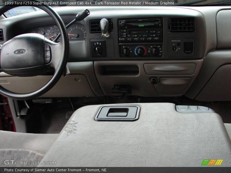 Dark Toreador Red Metallic / Medium Graphite 1999 Ford F250 Super Duty XLT Extended Cab 4x4