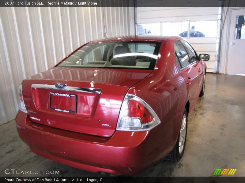 Redfire Metallic / Light Stone 2007 Ford Fusion SEL