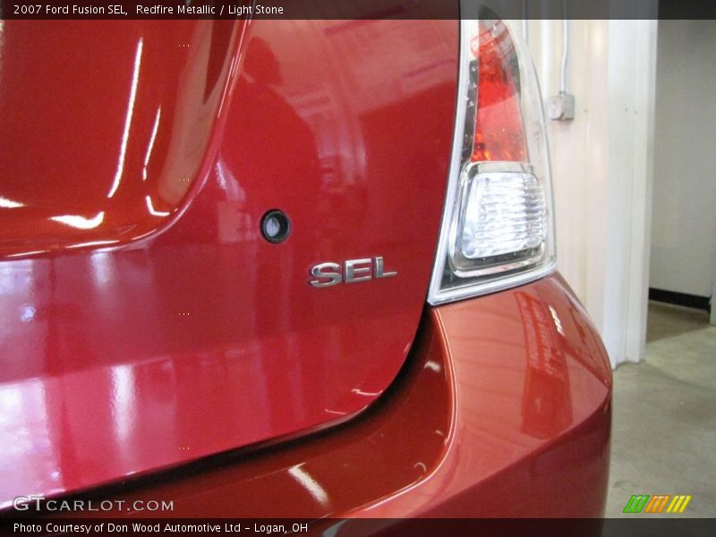 Redfire Metallic / Light Stone 2007 Ford Fusion SEL