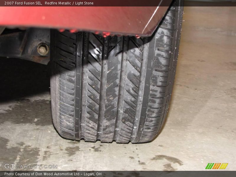 Redfire Metallic / Light Stone 2007 Ford Fusion SEL