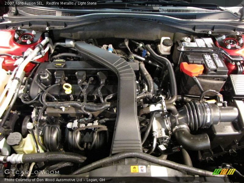 Redfire Metallic / Light Stone 2007 Ford Fusion SEL