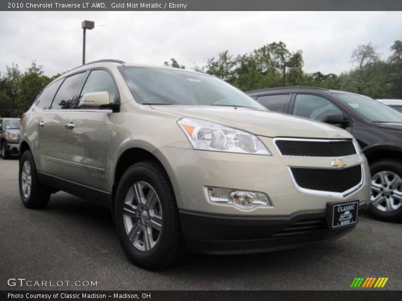 Gold Mist Metallic / Ebony 2010 Chevrolet Traverse LT AWD