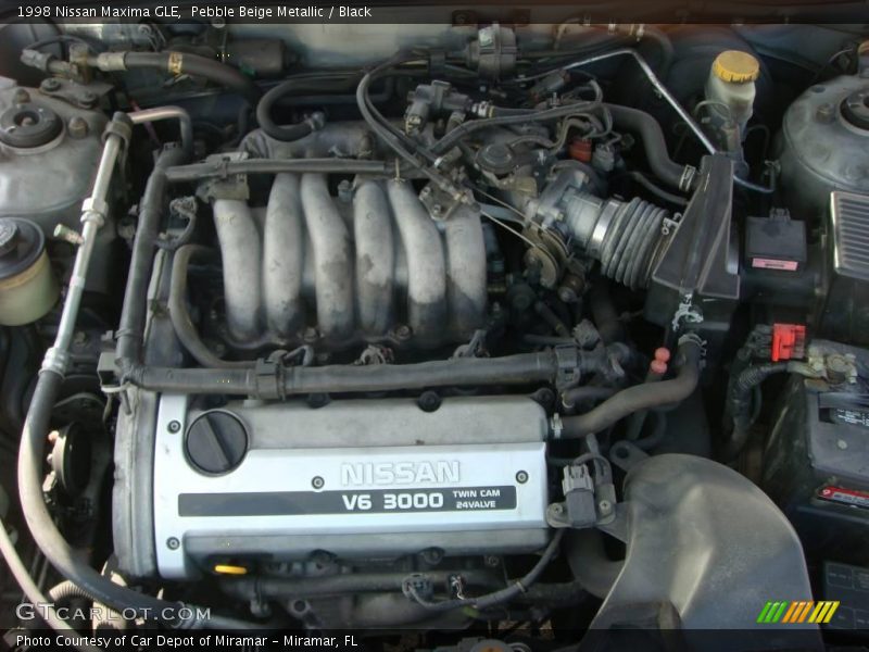 Pebble Beige Metallic / Black 1998 Nissan Maxima GLE