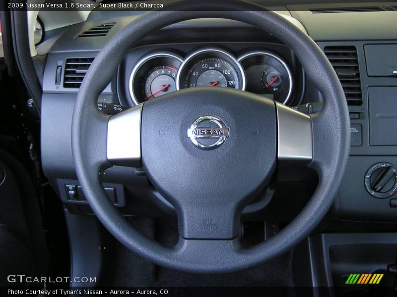 Super Black / Charcoal 2009 Nissan Versa 1.6 Sedan