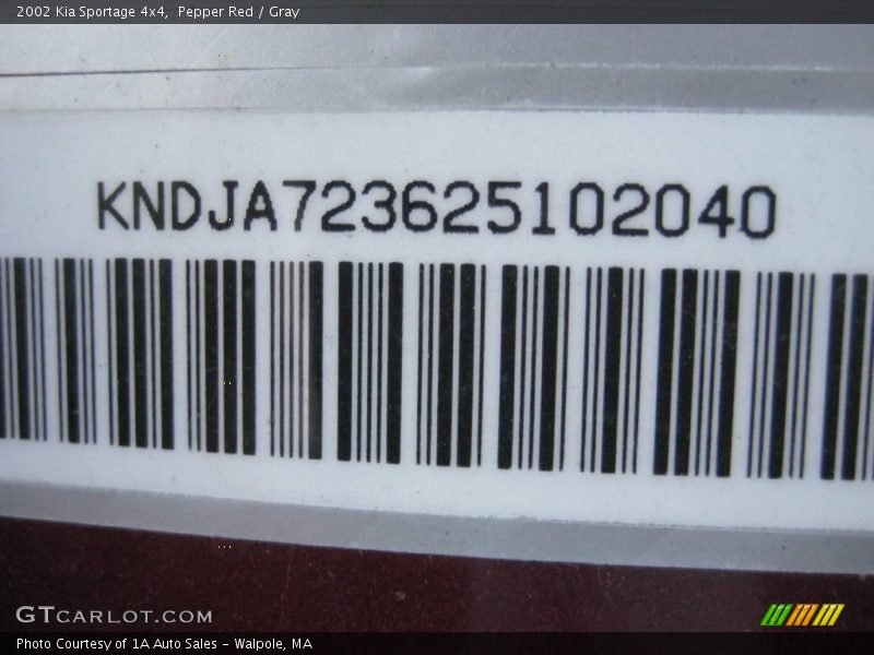 Pepper Red / Gray 2002 Kia Sportage 4x4