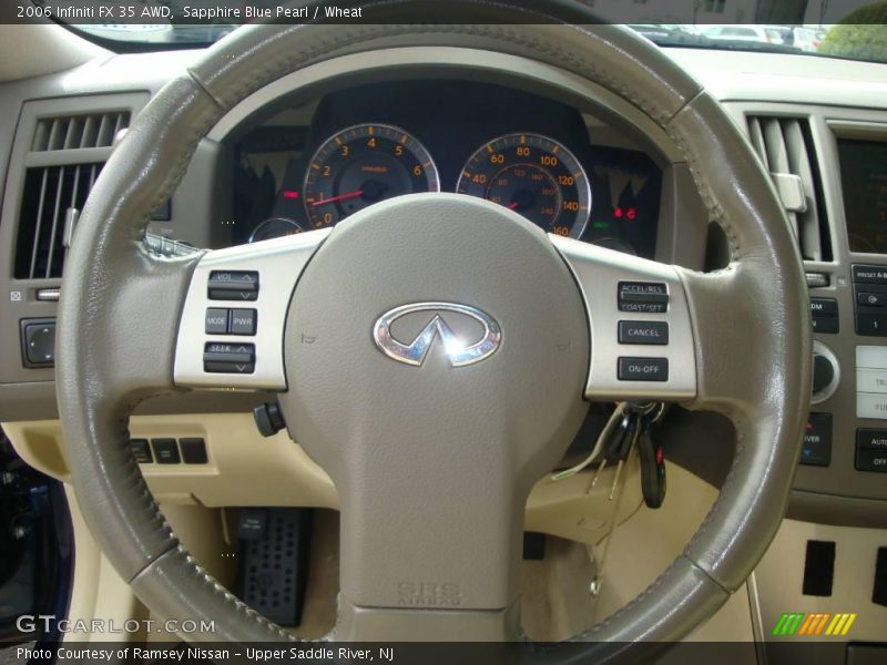 Sapphire Blue Pearl / Wheat 2006 Infiniti FX 35 AWD