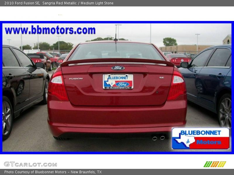 Sangria Red Metallic / Medium Light Stone 2010 Ford Fusion SE