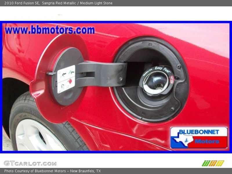 Sangria Red Metallic / Medium Light Stone 2010 Ford Fusion SE