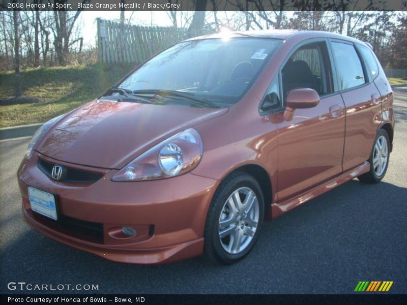 Blaze Orange Metallic / Black/Grey 2008 Honda Fit Sport