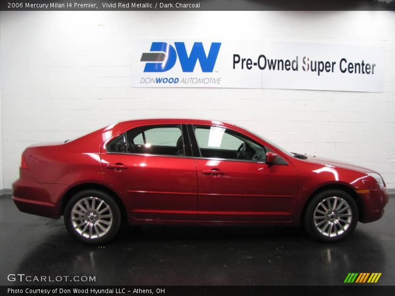 Vivid Red Metallic / Dark Charcoal 2006 Mercury Milan I4 Premier