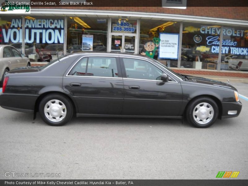 Sable Black / Black 2002 Cadillac DeVille Sedan