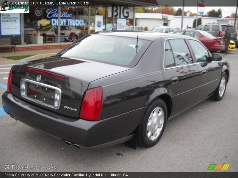 Sable Black / Black 2002 Cadillac DeVille Sedan