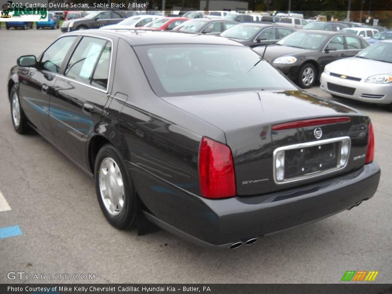 Sable Black / Black 2002 Cadillac DeVille Sedan